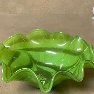 Hand blown green glass bowl.  Certainly an eye catcher.
